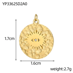 Detailed view of evil eye sun pendant with 1.7cm x 1.6cm dimensions and 2.7g weight