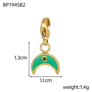 Detail of crescent moon pendant with green enamel, lobster clasp and size measurements