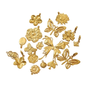 Gold stainless steel pendants set with butterfly, bee and flower designs for DIY jewelry
