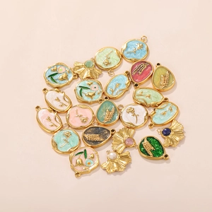 French vintage gold pendants with floral relief and enamel for DIY jewelry making