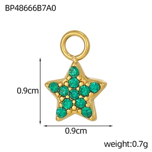 Detailed view of 0.9cm star charm with green cubic zirconia and gold finish measurements