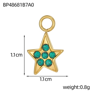 Detailed view of star pendant with green zircon and dimensions of 1.1cm by 1.1cm
