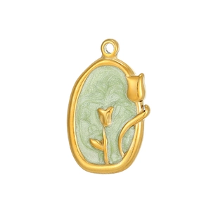Detailed view of oval gold tulip pendant with green enamel inlay for DIY jewelry