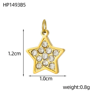 Macro detail of gold star pendant with cubic zirconia inlay and 1.2cm size measurements