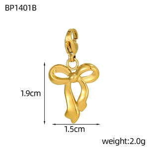Detailed view of a gold bow pendant with dimensions 1.9cm by 1.5cm and lobster clasp