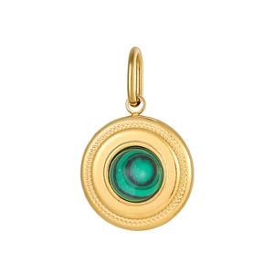 Macro shot of gold pendant featuring round malachite stone with textured woven edge