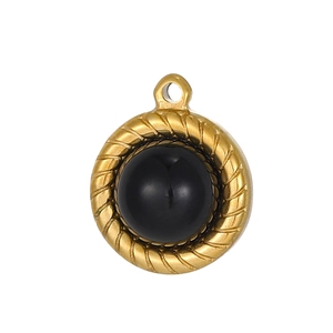 Detailed close-up of retro golden round pendant with black stone and twisted edge inlay