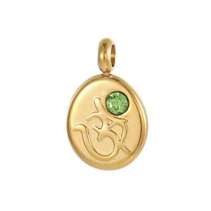 Detailed close-up of golden oval pendant featuring Om symbol and green zircon stone