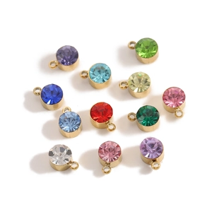 Set of 12 colorful round birthstone pendants with gold plated stainless steel edges