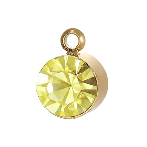 Detailed macro view of yellow faceted birthstone pendant with gold-plated loop setting
