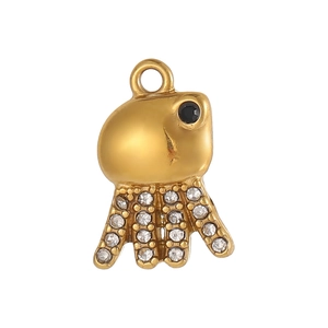 Gedetailleerde weergave van een vergulde octopus hanger met zwarte steen en witte zirkonia