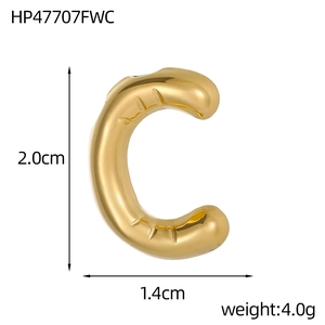 Detail view of 14k gold bubble letter C pendant with measurements 2.0cm and 4.0g weight