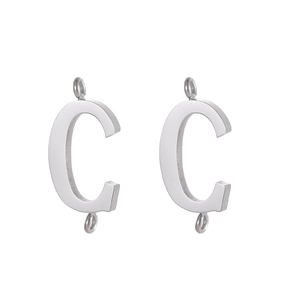 Detailed view of silver stainless steel letter C charms with double connector rings for DIY