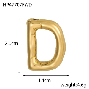 Macro detail of golden letter D bubble pendant showing 2.0cm height and bamboo texture