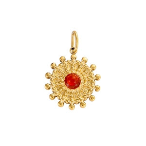 Macro view of golden sunflower pendant with red gemstone and detailed beaded radial texture