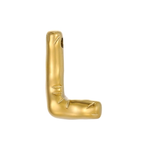 Macro detail of puffy 14k gold plated letter L charm with unique bread cut texture