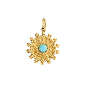 Detail of vintage sunburst stainless steel pendant with blue turquoise stone inlay