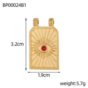 Baroque evil eye pendant with sunburst engraving and red gemstone, 3.2cm x 1.9cm