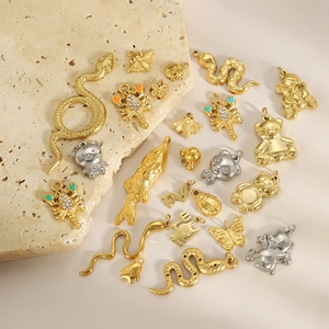 Golden and silver stainless steel animal charms featuring bear, butterfly, and bee designs