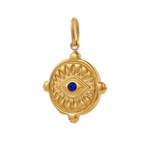 Macro detail of gold vintage evil eye pendant with blue zircon and sunburst texture
