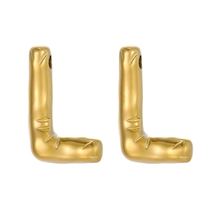 Detailed view of two 14k gold bubble initial L pendants with textured surface