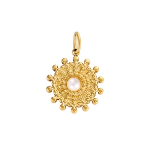 Detailed macro view of vintage gold sunflower pendant featuring a white pearl inlay