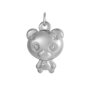 Macro detail of bear pendant with number 21 engraving and polished silver finish