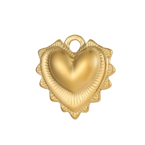 Macro shot of gold heart pendant featuring radiant sunburst edges and smooth polished finish