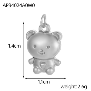 Detail view of a bear-shaped stainless steel pendant with heart motif and size dimensions