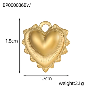 Detailed view of a gold heart pendant with radial textures and dimensions of 1.8cm by 1.7cm