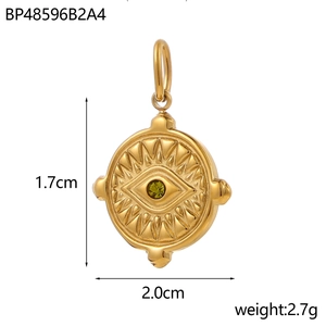 Detail of round gold evil eye pendant with green zircon and 2.0cm size marking