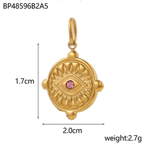 Macro shot of gold stainless steel evil eye pendant with purple zircon and size specs