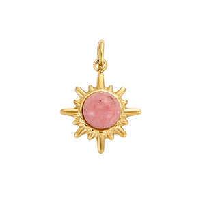 Macro detail of sunburst pendant with 18k gold plating and pink natural stone