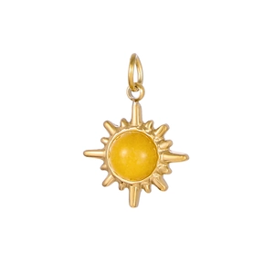 Close-up of vintage sunburst pendant in gold finish with a round yellow stone inlay