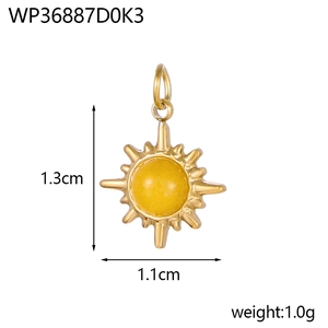 Detailed view of vintage gold sun pendant with measurements 1.3cm by 1.1cm and 1g weight