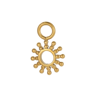 Detail of vintage sunburst stainless steel pendant with hollow circle for DIY jewelry