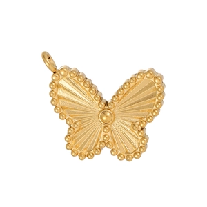 Macro detail of golden butterfly pendant with beaded edges and sunburst texture