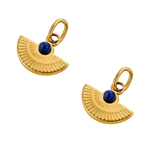 Detailed macro view of fan-shaped gold pendants with grooved texture and blue stone