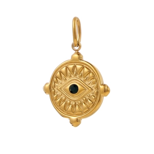 Detailed view of vintage gold evil eye medallion pendant with black gemstone inlay