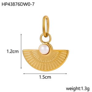 Macro shot of gold fan pendant with dimensions 1.5cm width and 1.3g weight data