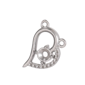 Close-up of stainless steel heart pendant base with four-prong round setting for DIY