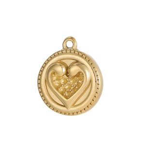 Detailed macro view of a gold heart embossed circular pendant with beaded edge detail