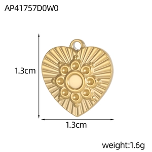 Detailed view of heart pendant with sunburst texture and 1.3cm dimension marking