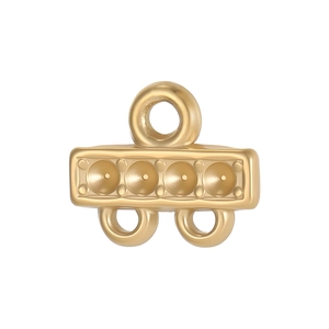 Macro view of a gold-plated multi-link connector piece for layered necklaces and jewelry