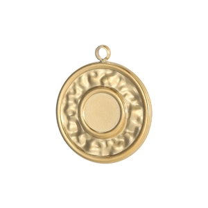 Detailed view of round gold stainless steel pendant with textured edges and smooth DIY center