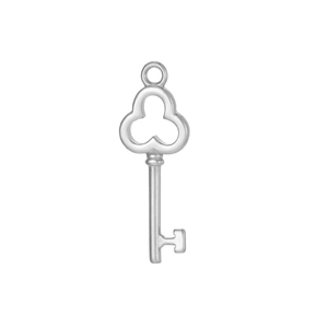 Close-up of polished silver key pendant with trefoil top and detailed mechanical teeth