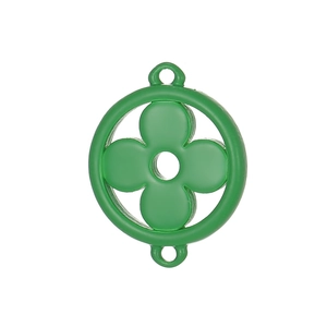 Macro detail of a green four-leaf clover pendant charm for DIY jewelry making
