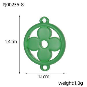 Detail of round green enamel clover charm with 1.4cm height and 1.1cm width dimensions