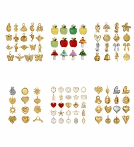 Collection of stainless steel pendants featuring geometric, fruit, and butterfly designs