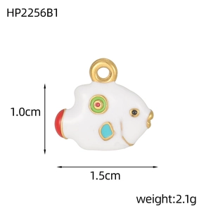 Detailed view of fish-shaped enamel pendant with dimensions 1.0cm by 1.5cm and red tail fin